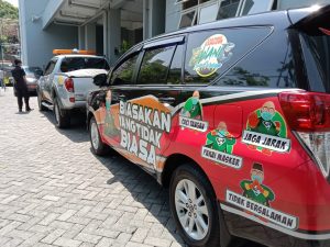 Sosialisasikan Protokol Kesehatan, BPB Linmas Surabaya Punya Cara Berbeda