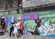 Surabaya is Yours : Norton Bangunan, Undang Seniman Grafity Percantik Tembok Halaman Parkir Toko